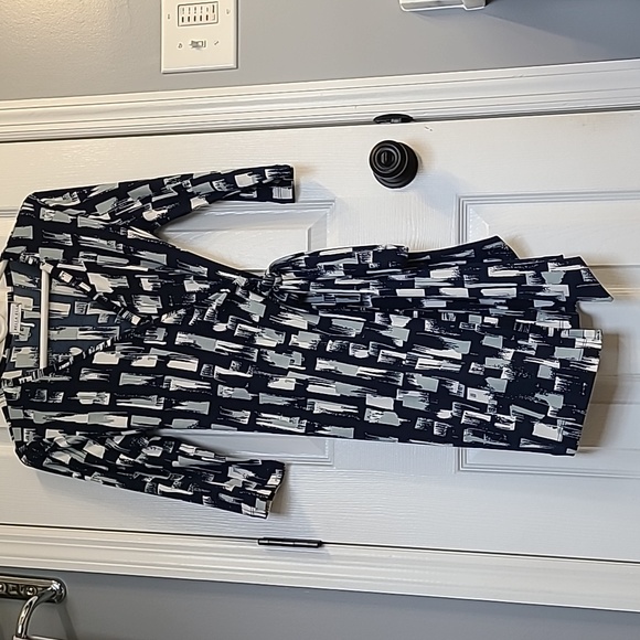 Bella Ella Dresses & Skirts - 2/$10- Wrap dress -never worn